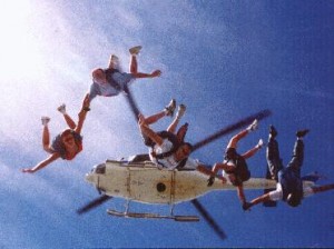 Baja, Micheal Jernigan, Tracy George, Renaté Di Noia, and Jerry Hoekstra diving from a helicopter